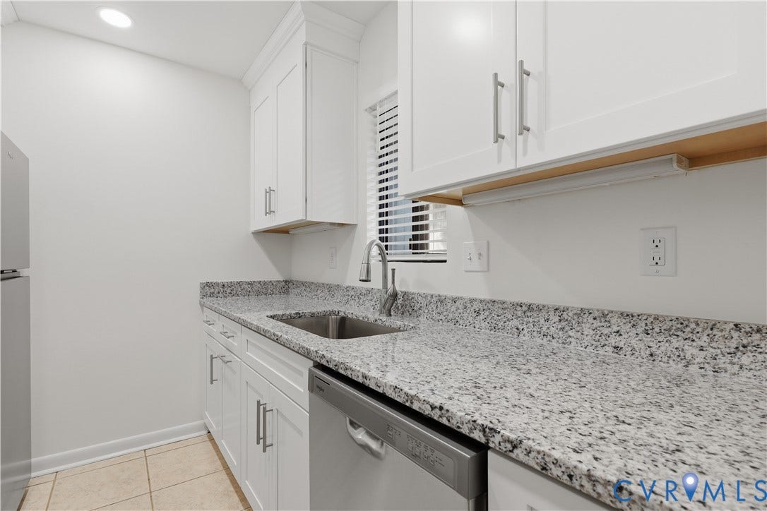 11947 W Briar Patch Drive, Chesterfield, VA 23113 Kitchen featuring white shaker-style cabinetry, speckled stone countertops, a stainless steel undermount sink with a gooseneck faucet, stainless steel dishwasher, and tile flooring