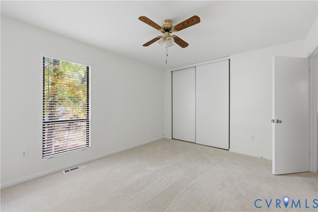 11947 W Briar Patch Drive, Chesterfield, VA 23113 Neutral wall finishes, carpeting, ceiling fan with light fixture, sliding door closet, and window with blinds