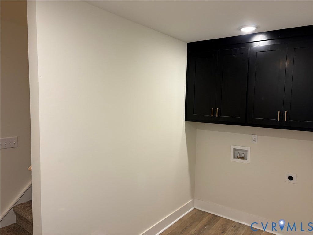 15135 Lebanon, Parson's Retreat, Disputanta, VA 23842 Black built-in upper cabinetry, wood-finish flooring, and recessed ceiling lighting