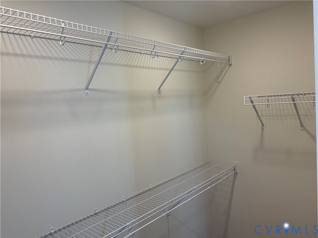 15135 Lebanon, Parson's Retreat, Disputanta, VA 23842 Walk-in closet featuring multi-level white wire shelving and integrated garment rods