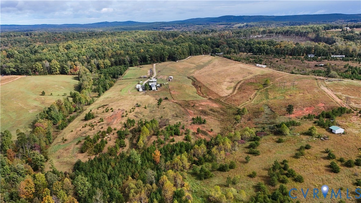 290 Western Lane, Appomattox, Appomattox, VA 24522 Expansive acreage featuring rolling topography, cleared pasture land, wooded boundaries, and distant mountain horizons