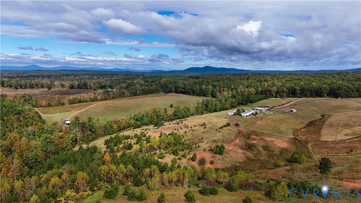 290 Western Lane, Appomattox, Appomattox, VA 24522 Expansive acreage featuring rolling topography, mature forest coverage, cleared open fields, and mountain range scenery