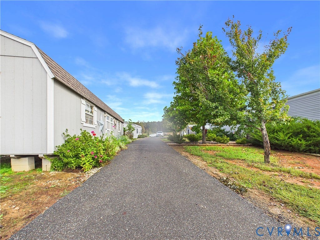 290 Western Lane, Appomattox, Appomattox, VA 24522 Asphalt driveway flanked by mature trees and landscaped shrubbery