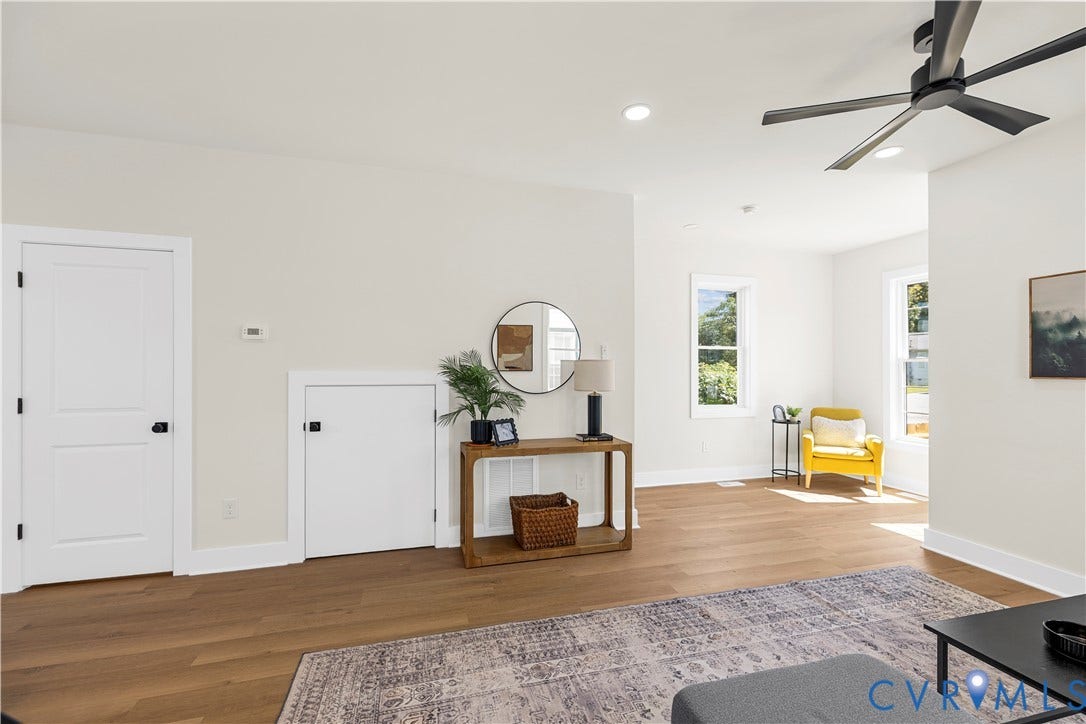 851 E Bank Street, Old Towne, Petersburg, VA 23803 Wood-finish flooring, recessed lighting, matte black ceiling fan, and multi-pane windows