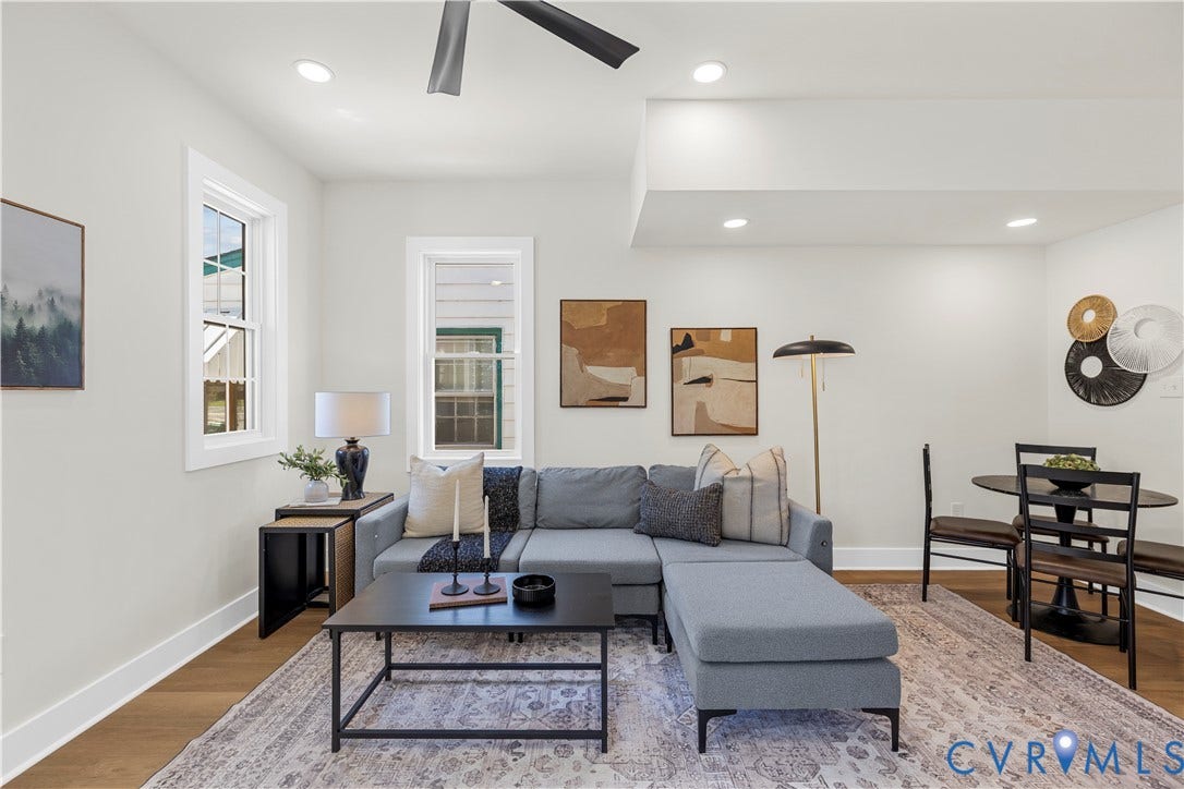 851 E Bank Street, Old Towne, Petersburg, VA 23803 Neutral wall palette, recessed lighting, multi-blade ceiling fan, and wood-finish flooring