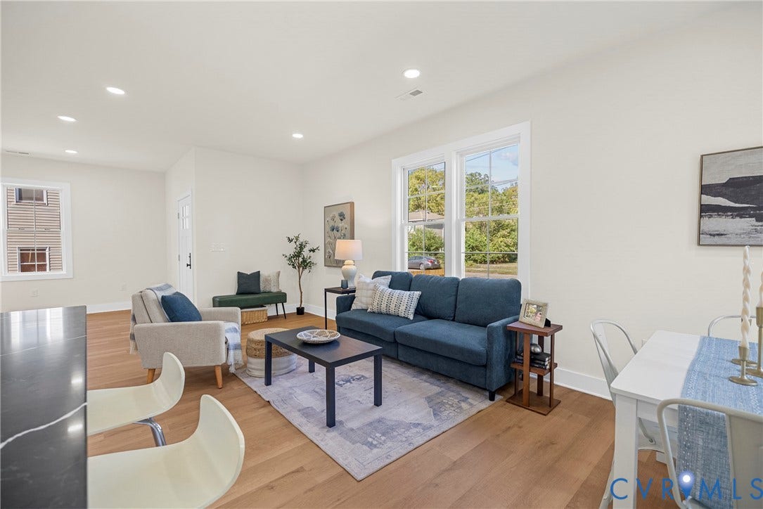 1420 Ferndale Avenue, Petersburg, VA 23803 Open-concept interior featuring light wood-finish flooring, recessed lighting, and large double-pane windows