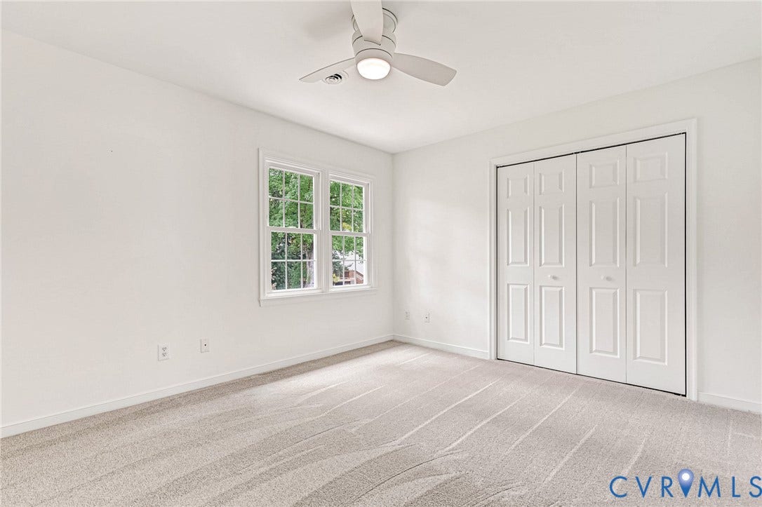 3629 Milbury Run Street, Henrico, VA 23233 Neutral carpet flooring, multi-panel closet doors, white ceiling fan with integrated lighting, and dual-pane windows with grid mullions