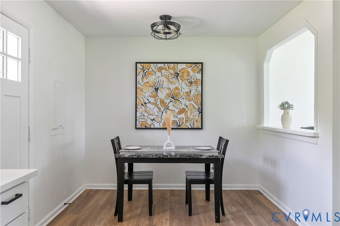 1809 Sussex Street, Whitcomb, Richmond, VA 23223 Wood-finish flooring, industrial-style cage lighting, and a recessed wall niche