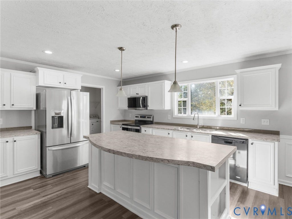 1625 Cedar Lane, Powhatan, VA 23139 Kitchen featuring white cabinetry, stone-finish countertops, stainless steel appliances, a central island, and wood-finish flooring