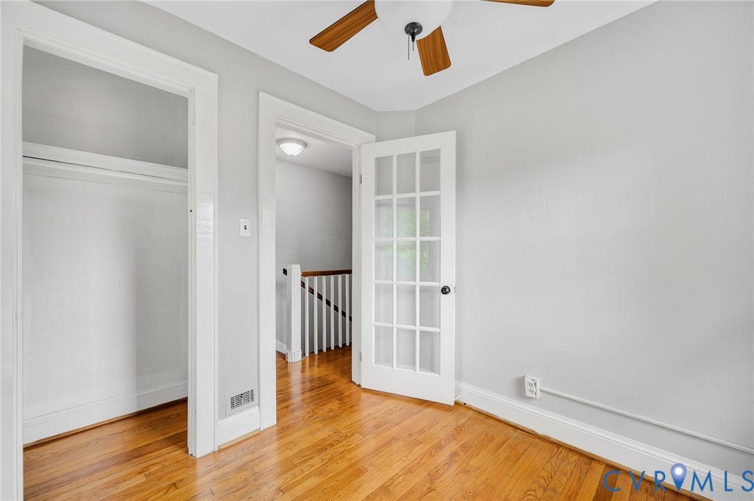 602 N 39th Street, Chimborazo, Richmond, VA 23223 Wood-finish flooring, glass-paneled French door, ceiling fan, and built-in closet storage