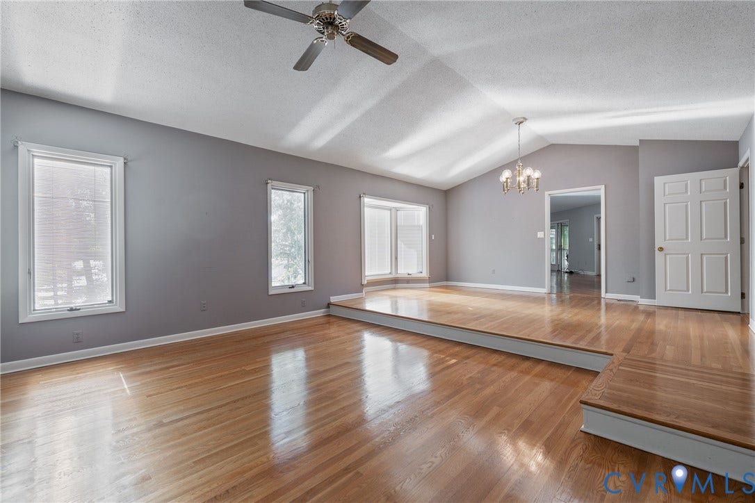 10862 Walton Lake Road, Dick Woods Subdivision, Disputanta, VA 23842 Vaulted ceilings, wood-finish flooring, recessed bay window, multi-level design, and tiered platform