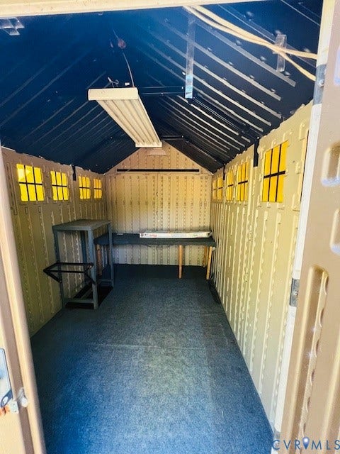1525 Circle Drive, Petersburg, VA 23803 Outbuilding featuring a vaulted ceiling, multiple fixed windows, integrated overhead lighting, and reinforced structural walls
