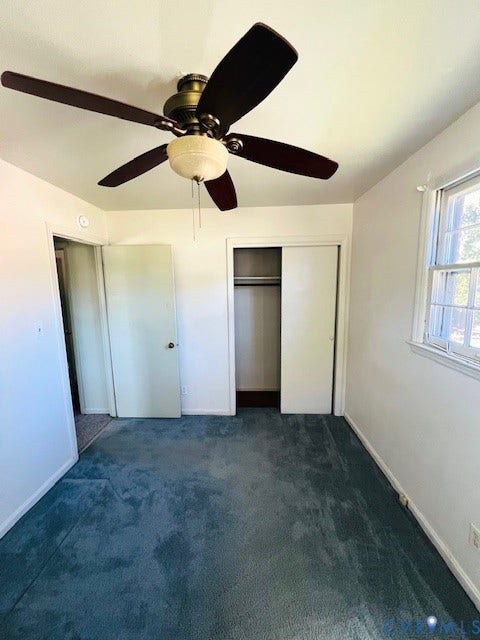 1525 Circle Drive, Petersburg, VA 23803 Ceiling fan with integrated lighting, wall-to-wall carpeting, and a closet with sliding doors