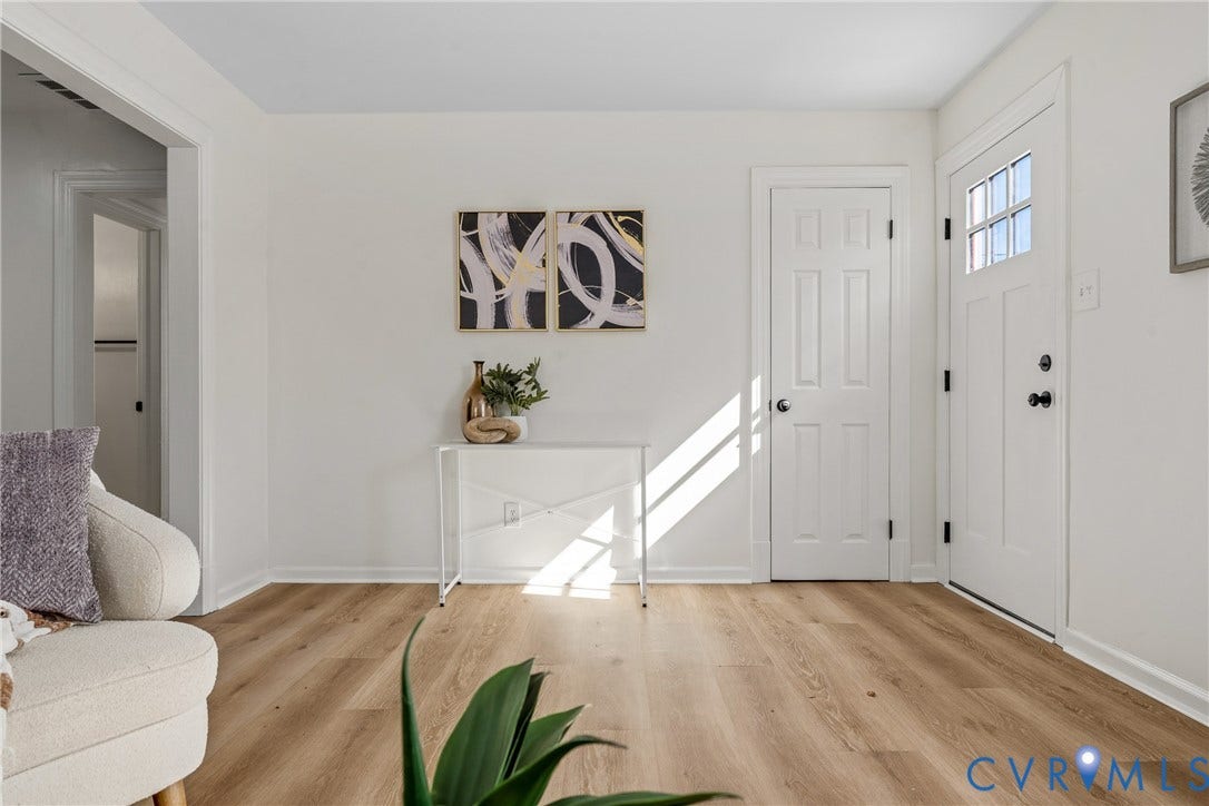 2106 Kenwood Avenue, Henrico, VA 22229 Entryway featuring wood-finish flooring, a six-panel door with a multi-pane glass insert, and neutral wall tones