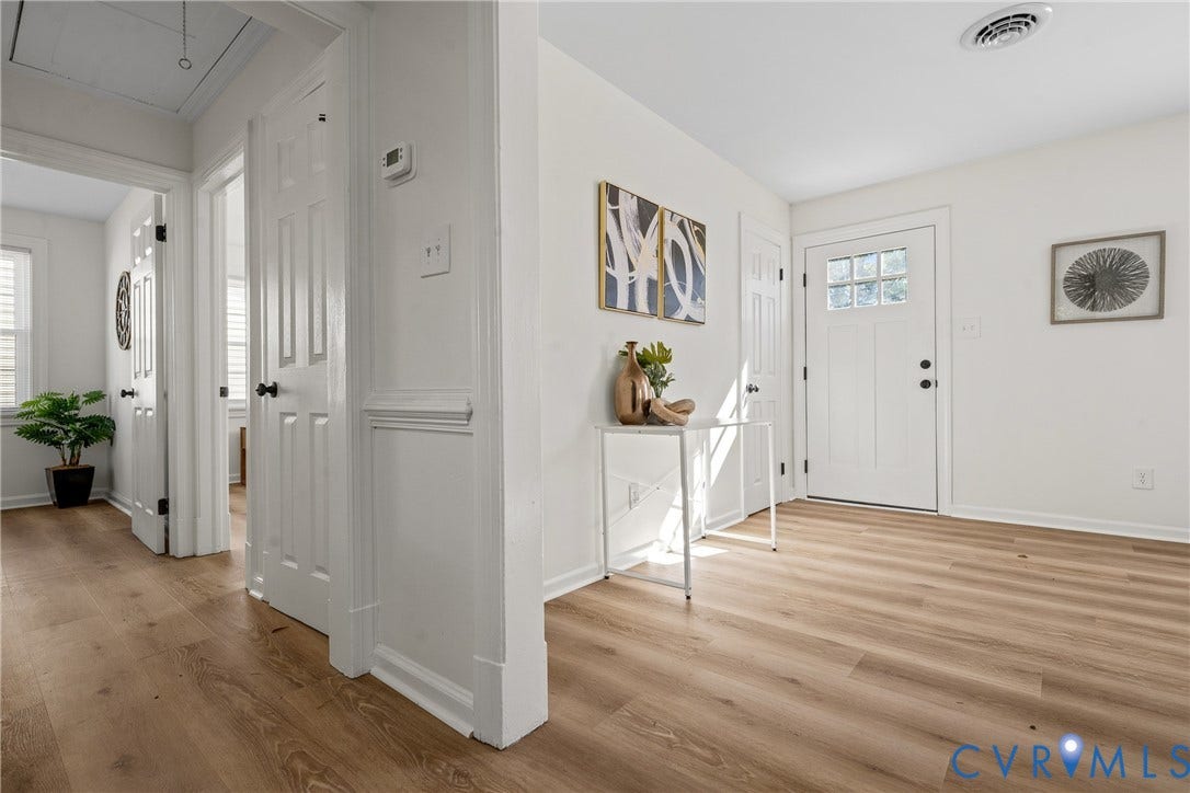 2106 Kenwood Avenue, Henrico, VA 22229 Entryway featuring wood-finish flooring, white panel doors, chair rail molding, and a front door with glass pane detail