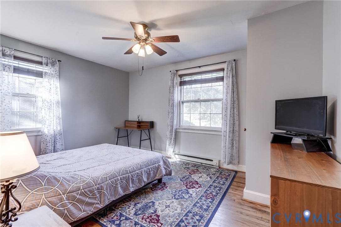4007 Austin Avenue, Richmond, VA 23222 Room featuring neutral-toned walls, dual windows with multi-pane glass, and wood-finish flooring