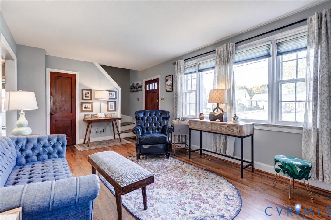 4007 Austin Avenue, Richmond, VA 23222 Living area featuring wood-finish flooring, multi-pane windows, and a classic paneled wood door