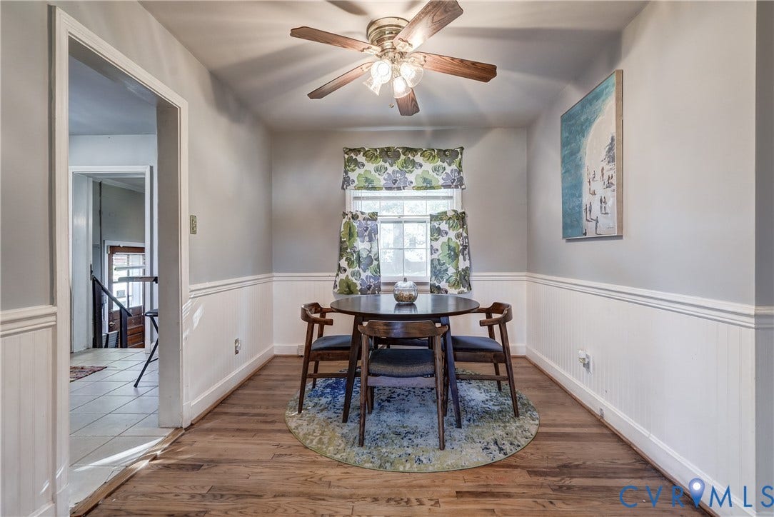 4007 Austin Avenue, Richmond, VA 23222 Wood-finish flooring, chair rail molding, wainscoting, and a multi-light ceiling fan
