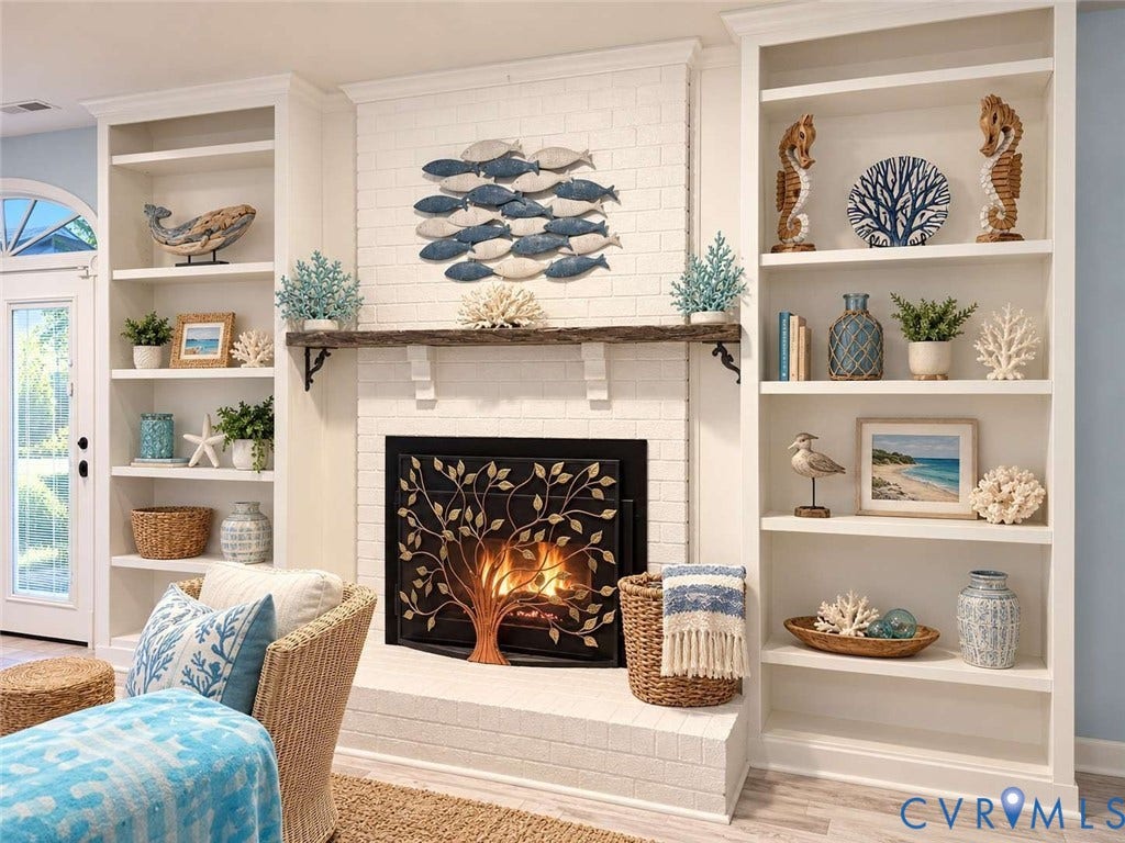 5424 Bellswood Drive, Mechanicsville, VA 23111 Fireplace featuring a white painted brick surround, a rustic wood mantel, and built-in floor-to-ceiling shelving