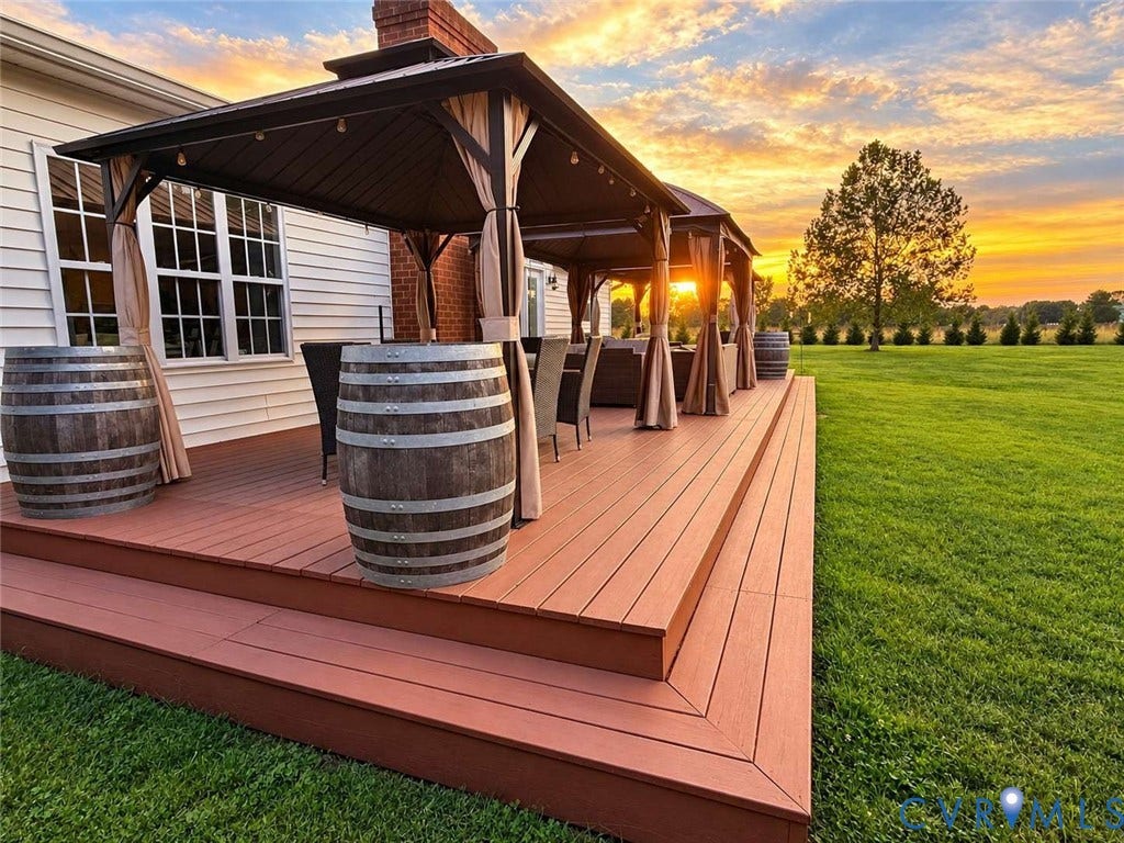 5424 Bellswood Drive, Mechanicsville, VA 23111 Multi-level composite deck featuring a metal-frame gazebo structure and expansive rear lawn