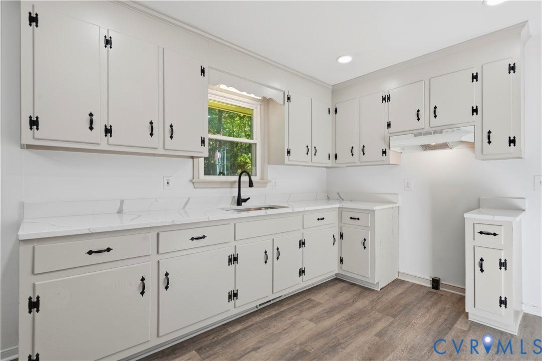 3622 New Bethel Road, Meherrin, VA 23954 Kitchen featuring light-toned cabinetry with matte black hardware, stone-finish countertops, an undermount sink with a high-arch faucet, recessed lighting, and wood-finish flooring