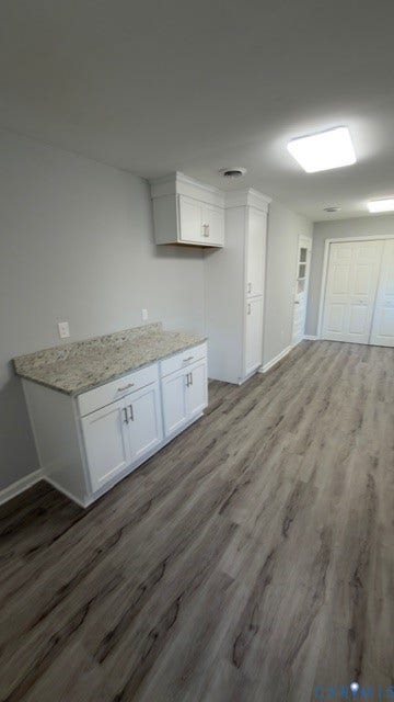 510 Old Town Drive, Ellerslie, Colonial Heights, VA 23834 White cabinetry with stone-finish countertops, tall pantry storage, wood-finish flooring, and recessed ceiling lighting