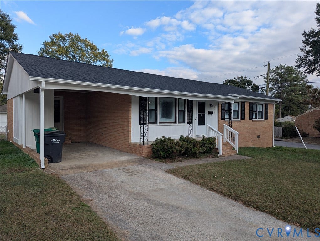 510 Old Town Drive, Ellerslie, Colonial Heights, VA 23834 Single-story brick exterior featuring a covered carport, asphalt shingle roof, concrete driveway, and front entryway with metal railings