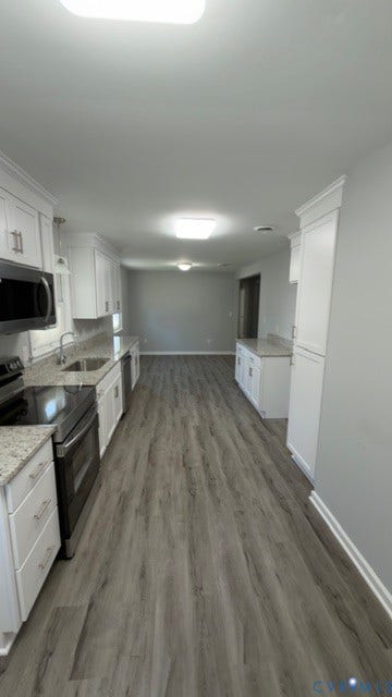 510 Old Town Drive, Ellerslie, Colonial Heights, VA 23834 Kitchen featuring white cabinetry, stone-finish countertops, stainless steel appliances, and wood-finish flooring