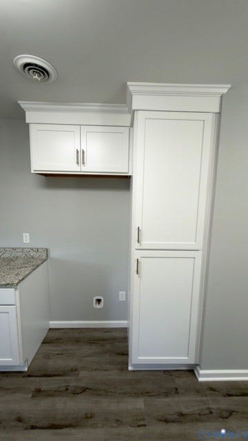 510 Old Town Drive, Ellerslie, Colonial Heights, VA 23834 Custom cabinetry with crown molding, stone-surface countertop, and wood-finish flooring