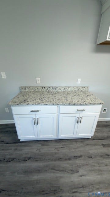 510 Old Town Drive, Ellerslie, Colonial Heights, VA 23834 Custom white shaker-style cabinetry featuring satin nickel hardware, light-toned stone-finish countertop with integrated backsplash, and wood-finish flooring