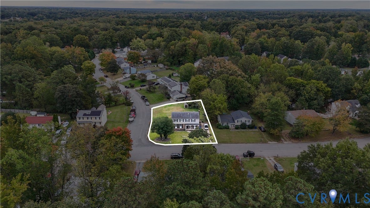 1101 Arch Hill Drive, Chesterfield, VA 23236 Aerial perspective of a detached residence featuring a corner lot, a multi-story exterior, an asphalt driveway, and mature landscaping