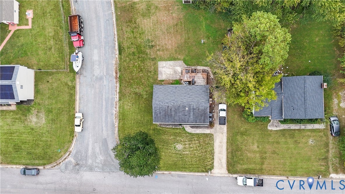 1101 Arch Hill Drive, Chesterfield, VA 23236 Aerial perspective featuring a residential lot with a concrete driveway and an outdoor wooden deck