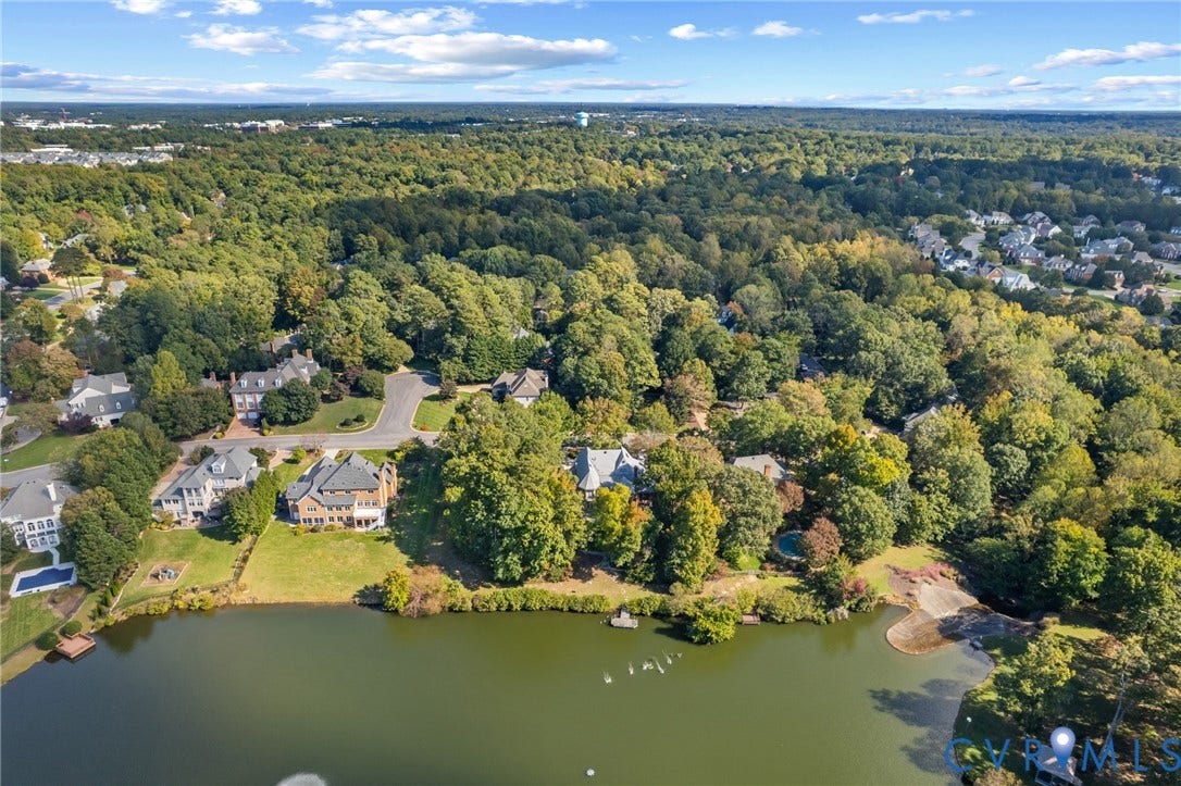 11433 Barrington Bridge Court, Henrico, VA 23233 Aerial perspective of residential lots featuring water frontage, extensive tree coverage, and paved roadway access