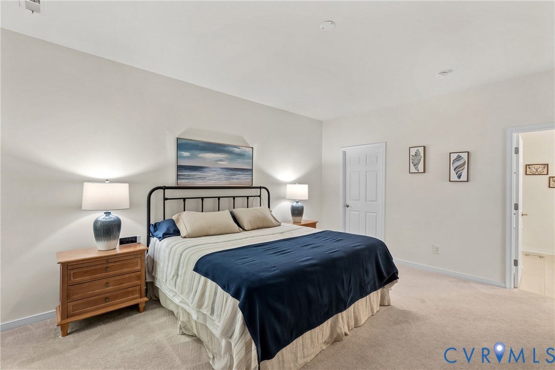 4914 Terrace Arbor Circle, Midlothian, VA 23112 Primary suite with neutral-toned wall paint, recessed lighting, carpeting with en-suite luxury bath