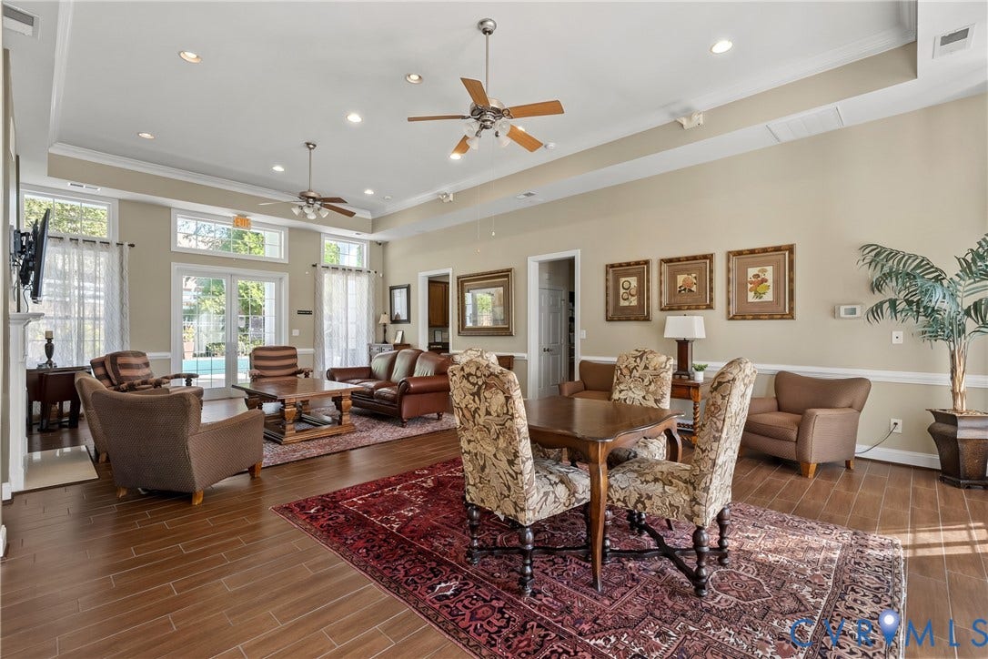 4914 Terrace Arbor Circle, Midlothian, VA 23112 Community Clubhouse open-concept space featuring tray ceilings, recessed lighting, wood-finish tile flooring, dual ceiling fans, and glass paneled doors