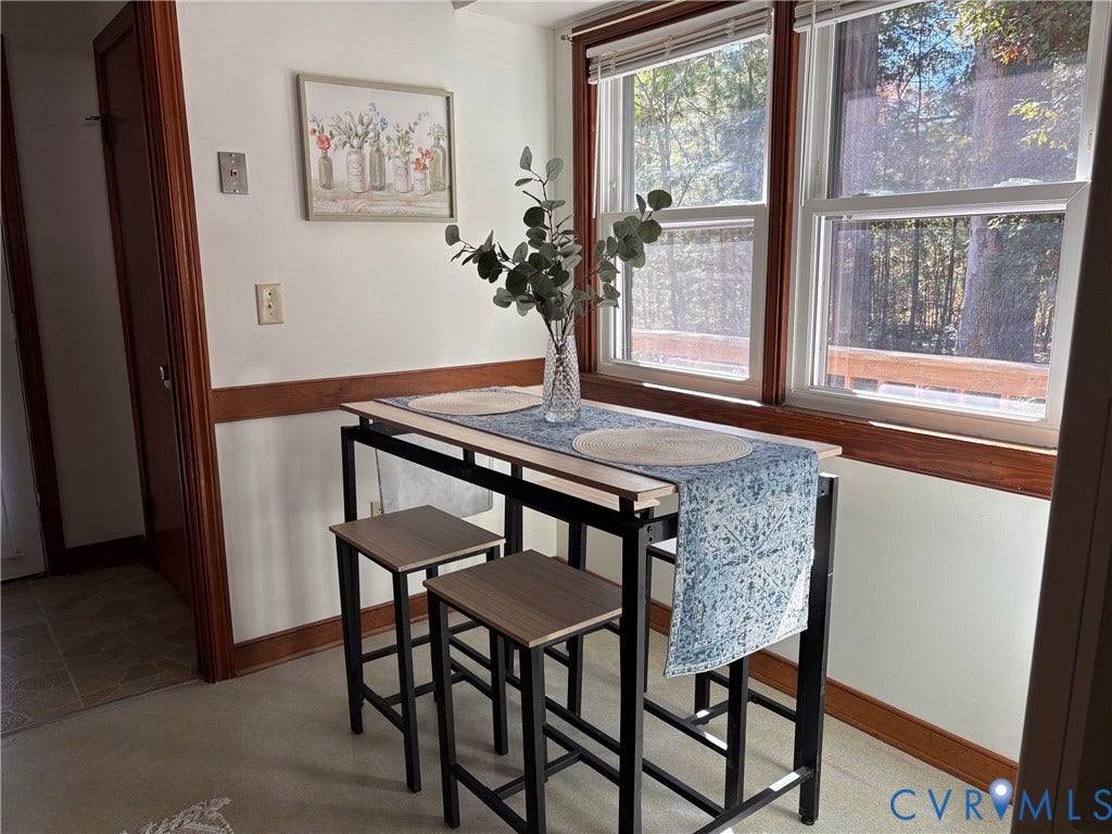 9012 Shawonodasee Road, Courthouse, Chesterfield, VA 23832 Double-hung windows with natural wood trim, chair rail molding, and neutral floor covering