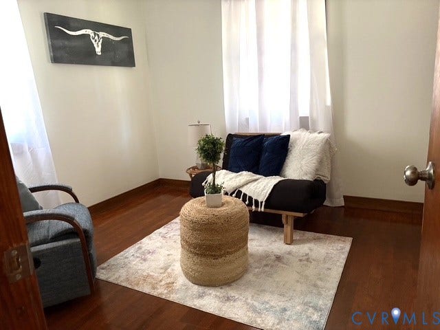 9012 Shawonodasee Road, Courthouse, Chesterfield, VA 23832 Room featuring hardwood-finish flooring, neutral wall tones, and windows framed with dual curtains