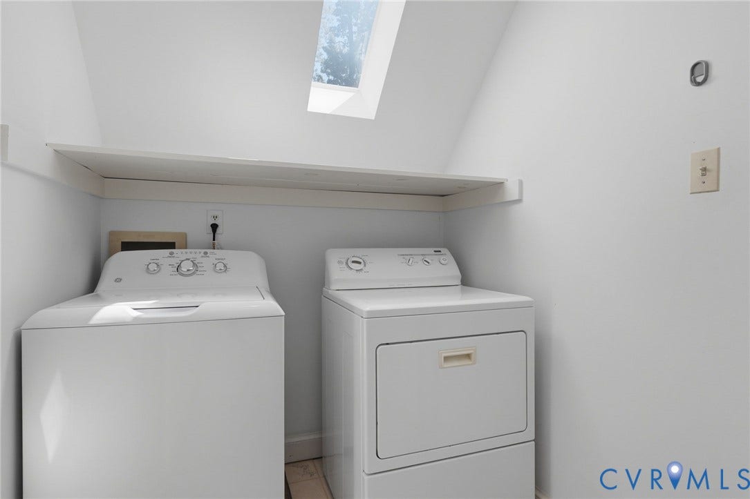 2311 Castle Hill Road, Midlothian, VA 23113 Laundry area featuring a skylight and integrated full-width shelving