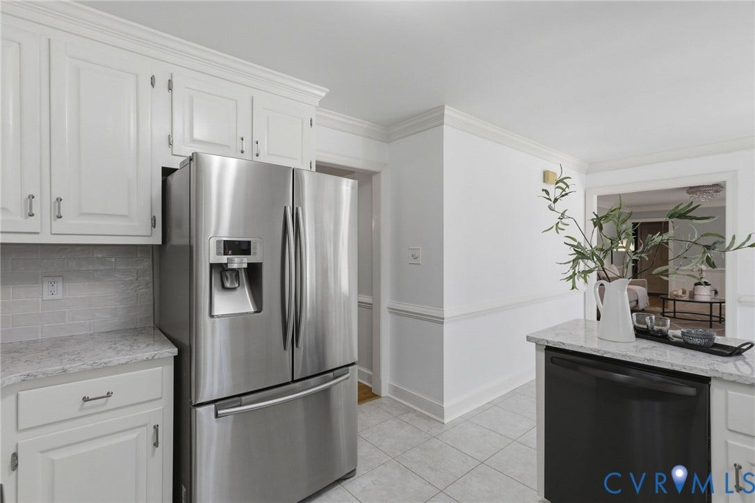 2311 Castle Hill Road, Midlothian, VA 23113 Kitchen featuring white shaker-style cabinetry, stone-finish countertops, subway tile backsplash, stainless steel refrigerator, and ceramic tile flooring