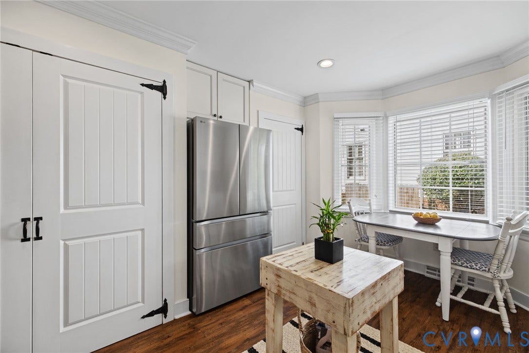 13908 Pagehurst Terrace, Salisbury, Midlothian, VA 23113 Stainless steel refrigerator, wood-finish flooring, recessed lighting, crown molding, and bay windows