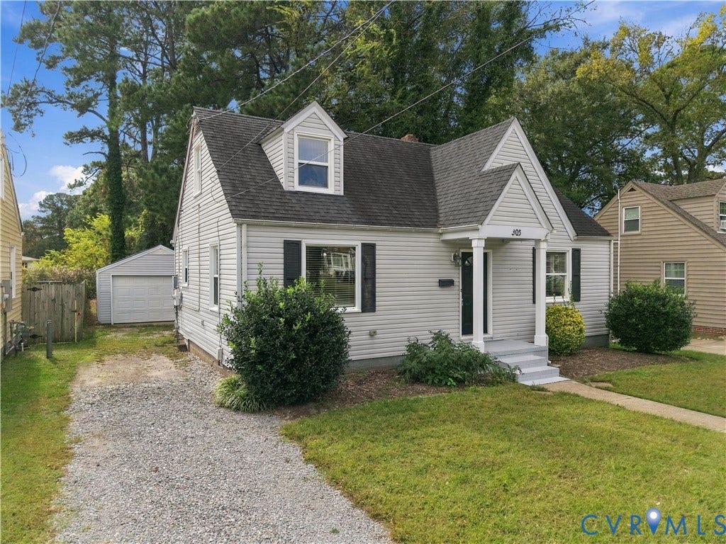 305 Arizona Street, Kingman Heights, Portsmouth, VA 23701 Cape Cod style exterior featuring horizontal siding, a gabled roofline, dormer window, covered front stoop with column support, and a detached single-car garage