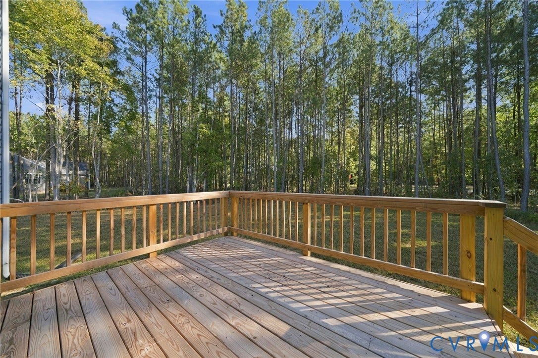 8209 Grantham Woods Way, Grantham Woods, Henrico, VA 23231 Raised wooden deck with railing overlooking mature trees and natural landscape
