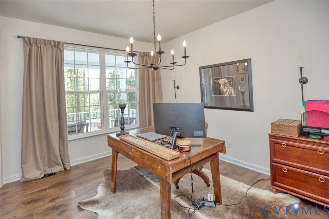 13501 Cooks Mill Court, Cooks Mill, Lanexa, VA 23089 Wood-finish flooring, multi-pane window with grid pattern, and classic black metal chandelier fixture