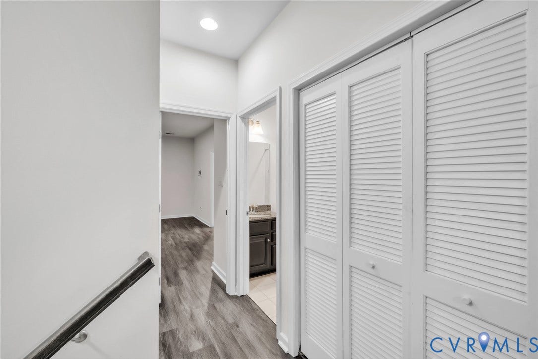 4511 Wistar Woods Trail, Richmond, VA 23228 Hallway featuring louvered closet doors, wood-finish flooring, and recessed ceiling lighting