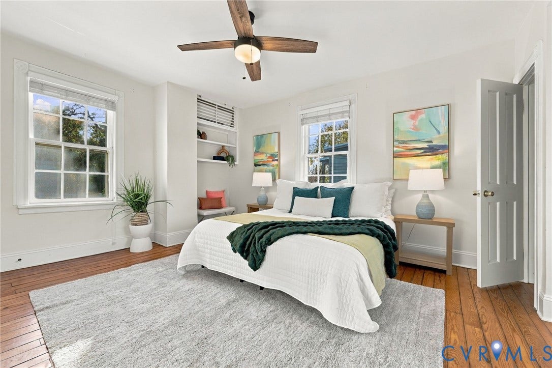 522 N 27th Street, Church Hill, Richmond, VA 23223 Room featuring wood-finish flooring, multi-pane windows, built-in shelving, and a ceiling fan with integrated lighting