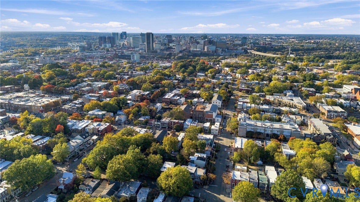 522 N 27th Street, Church Hill, Richmond, VA 23223 Aerial perspective featuring an expansive cityscape, mature tree canopy, and dense urban infrastructure