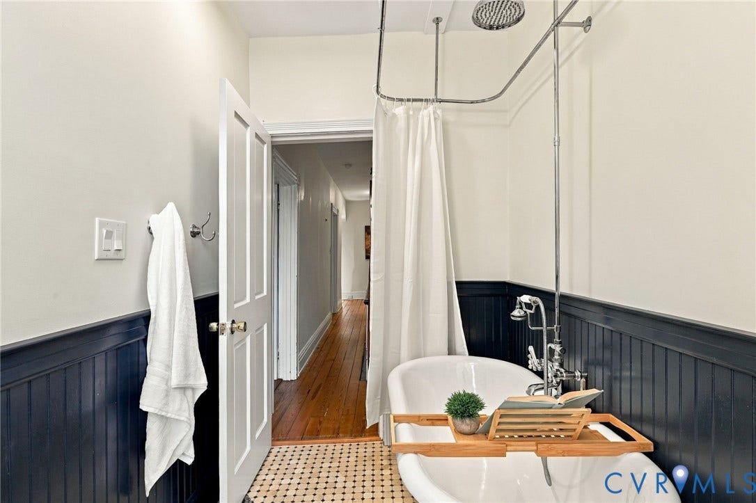 522 N 27th Street, Church Hill, Richmond, VA 23223 Hall bath w/ Clawfoot soaking tub with a chrome shower assembly, beadboard wainscoting, and mosaic tile flooring
