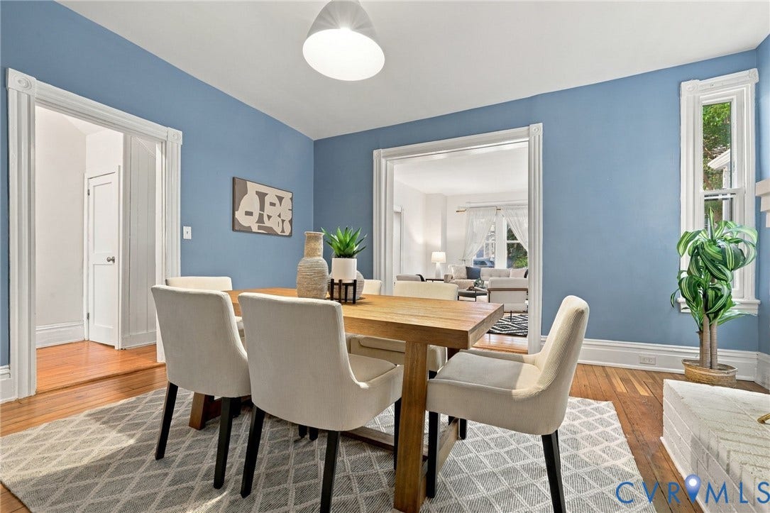 522 N 27th Street, Church Hill, Richmond, VA 23223 Dining area featuring hardwood flooring, architectural casing around doorways, large windows with millwork trim, and a dome pendant light fixture