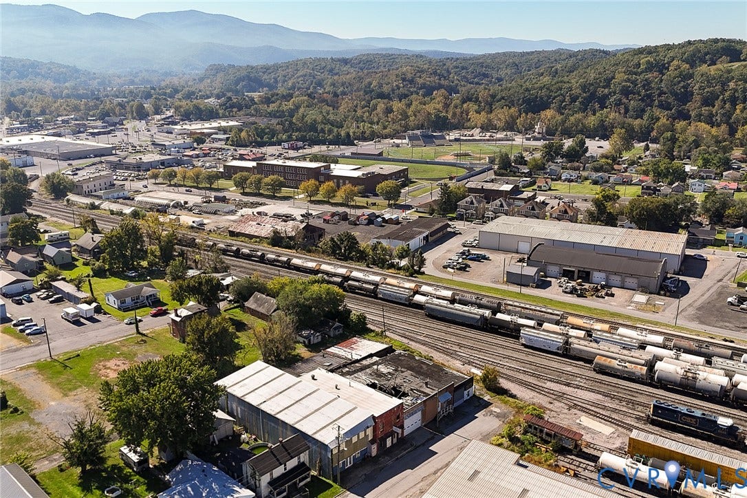 109 E Oak Street, Covington, VA 24426 Aerial perspective featuring expansive mountain range backdrop and surrounding mixed-use development