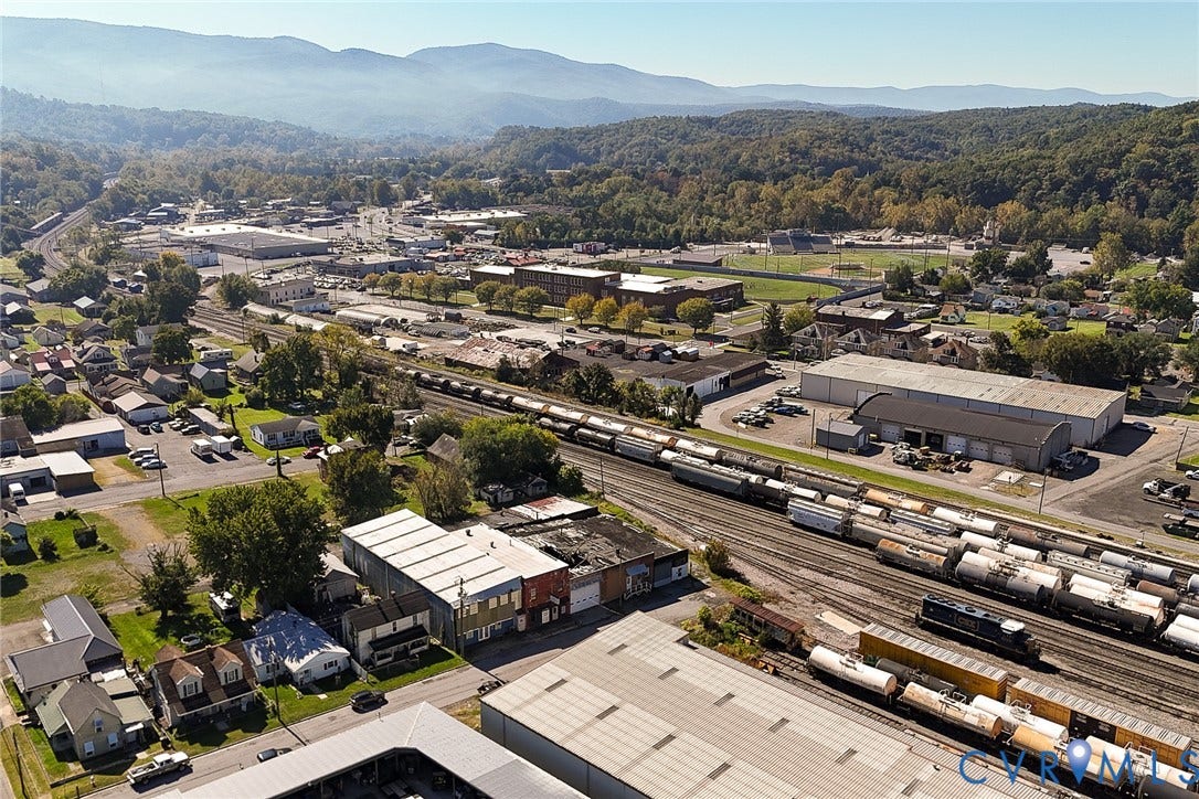 109 E Oak Street, Covington, VA 24426 Aerial perspective showcasing mountain range topography and surrounding industrial landscape